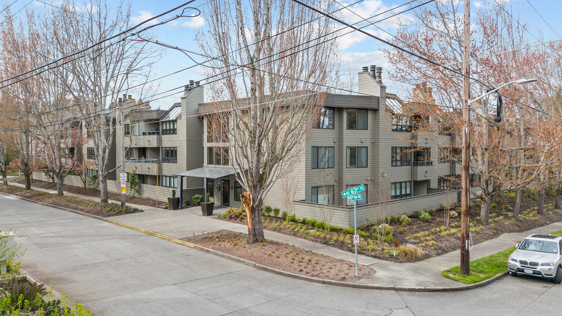 Corner exterior of the North Seattle condominium building at 6300 Sand Point Way